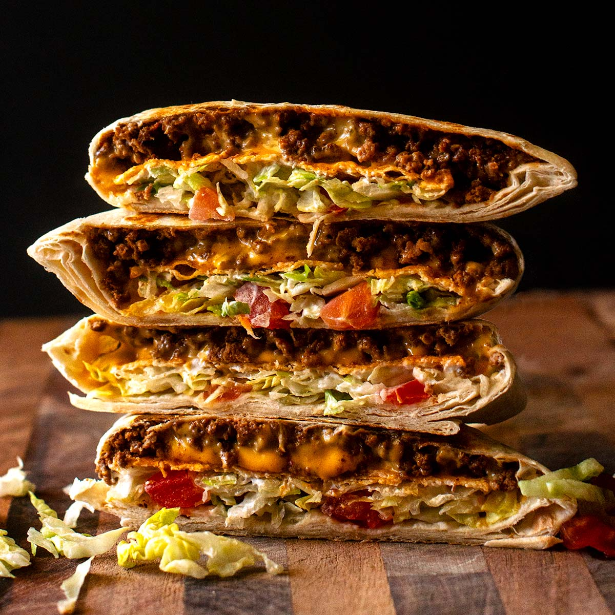 Gefüllte Tacos mit geschmolzenem Käse